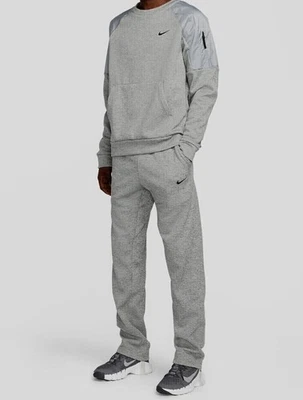 Pantalones deportivos Nike Therma-FIT para hombre dobladillo abierto gris DQ4856-063 talla grande L Foto 1 de 4