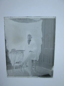 (1) LATE 1800s/EARLY 1900s GLASS NEGATIVE, MAN IN CHAIR-2, SCRATCHES,  UNKNOWN  - Picture 1 of 1
