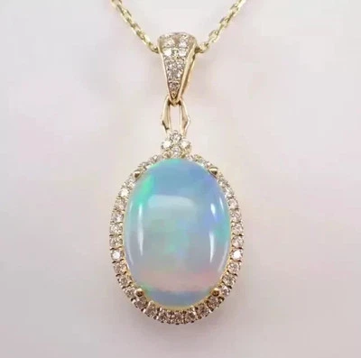 Colgante halo de ópalo de fuego natural de 3,00 quilates enchapado en oro amarillo de 14 quilates en plata Foto 1 de 4