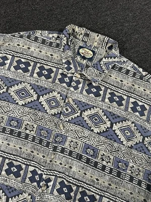 Camisa de campamento hawaiana Tommy Bahama para hombre grande azul abotonada lino azteca geométrica Foto 1 de 4