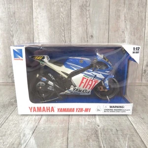 NEW RAY 43053 - 1:12 - Die-Cast Yamaha YZR-M1 Colin Edwards - OVP - #K47465 - Picture 1 of 7