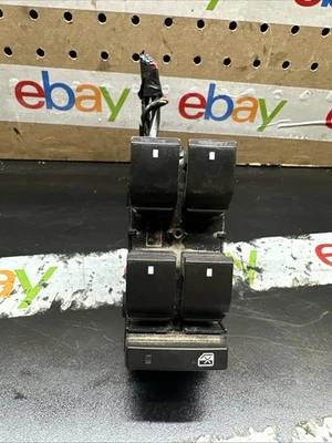 Interruptores y controles General Motors para GMC ACADIA 2006 Foto 1 de 4