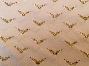 Harry Potter Golden Snitch Metallic Cotton Mask Fabric sold by 1/2 yard - Picture 1 of 2