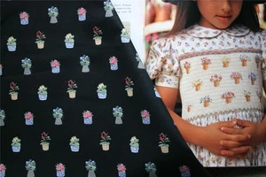 FLOWER POTS ON BLACK 100% COTTON  FABRIC SMOCKING QUILTING DOLL CLOTHES - Picture 1 of 1