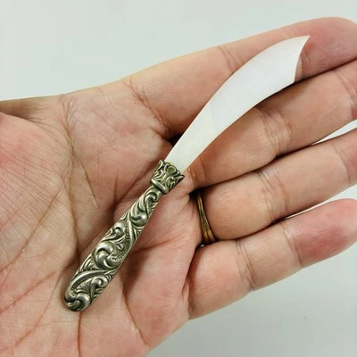 Cuchillo de queso vintage mango de plata esterlina hoja de mármol blanco 4" longitud total Foto 1 de 4