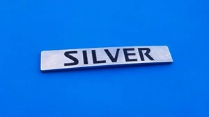 2010 2011 2012 NISSAN PATHFINDER SILVER REAR LID EMBLEM LOGO BADGE USED OEM B10 - Picture 1 of 4