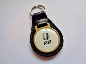 Vintage AT&T Schlüsselanhänger Metall und Leder um 1980 gebraucht - Bild 1 von 9