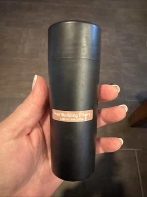 Fibras capilares marrón claro  Foto 1 de 3