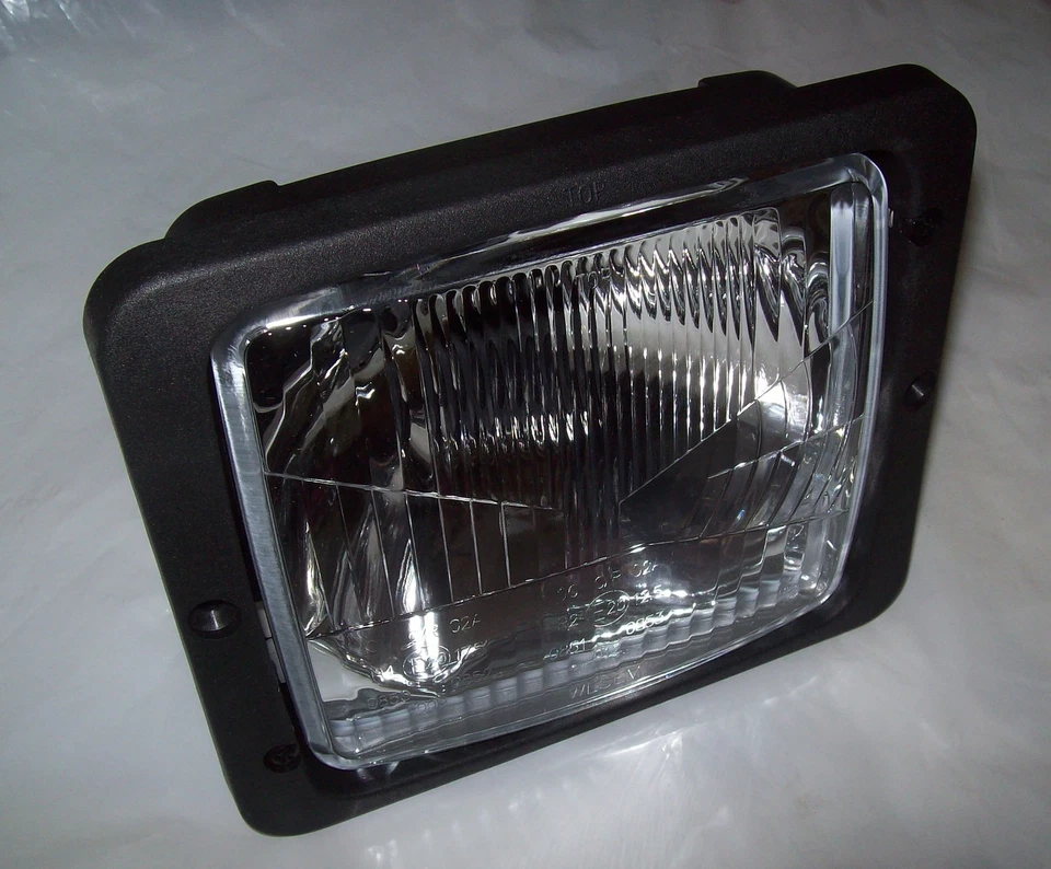 Scheinwerfer Scheinwerfereinsatz H4 für MB Trac Fendt IHC Case Schanzlin Holder  - Bild 1 von 2