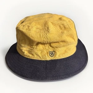 Cappello Brixton Shield Manchester Sunset Giallo/Lavato Navy Bucket Taglia S - Foto 1 di 3