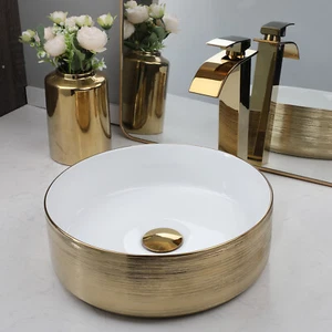 Rubinetto miscelatore lavabo bagno ceramica oro rubinetto pop-up combo scarico set - Foto 1 di 7