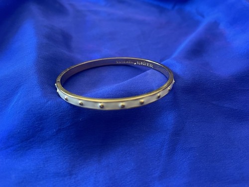 Bracciale Kate Spade New York panna smalto a pois tono oro 7 5"