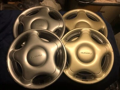 Varios tapacubos estilo Twist On Subaru Impreza 1995 1996 1997 se venden como están Foto 1 de 4