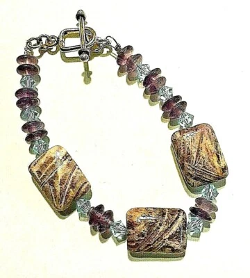  BRAZALETE B1 CHAROITA, AMATISTA Y SWAROVSKI ARTESANAL PLATA ESTERLINA Foto 1 de 3