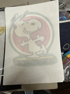 Vintage Snoopy on Skateboard Peanuts T-SHIRT IRON-ON VINTAGE 70s MT NOS - Picture 1 of 23