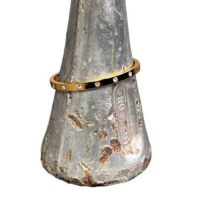 Brazalete con bisagras Kate Spade New York tono dorado estrás adornado Foto 1 de 4