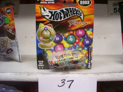 Kenny Schrader M and M's Global Color Vote Mattel Pontiac 2002 1/64 #36 Foto 1 de 4