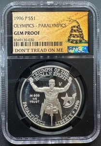 1996-P PARALYMPICS COMMEMORATIVE SILVER DOLLAR NGC DON'T TREAD ON ME LABEL - Picture 1 of 4