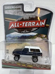 Greenlight 1987 GMC JIMMY azul oscuro y blanco '87 con RR TODO TERRENO Greenlight GL2 - Imagen 1 de 1