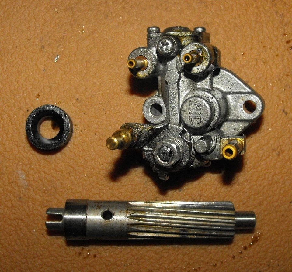 Mariner 40 HP Oil Pump Assembly PN 7101M Fits 1977-1990 - Image 1 of 2