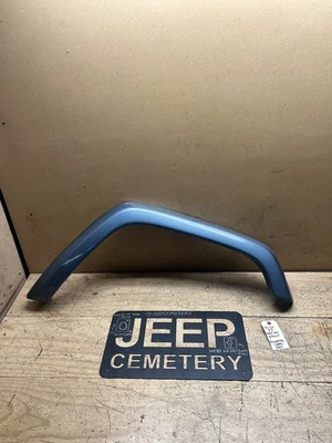 Jeep Cherokee XJ 97-01 pasajero delantero lado derecho guardabarros acabado plástico azul acampanado Foto 1 de 4