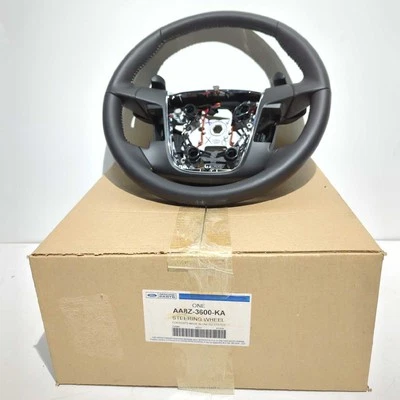 Nuevo volante envolvente de cuero negro Ford 2009-2012 paletas de cambio flexibles OEM Foto 1 de 4