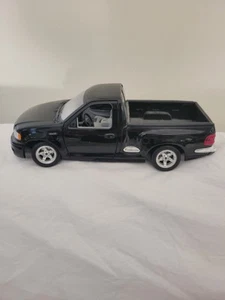 diecast 1/21 Burago Ford 150 SVT Lightning Black - Picture 1 of 12