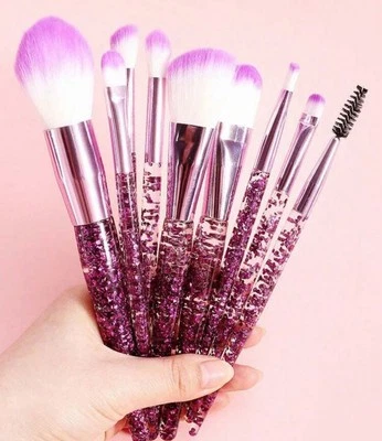 Juego de 10 brochas de maquillaje de cristal transparente y arena fluida. Foto 1 de 4