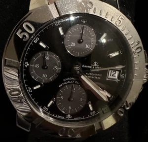 Baume & Mercier Capeland MOA08112 Automatik Chronograph schwarzes Zifferblatt Herren Gummi - Bild 1 von 15