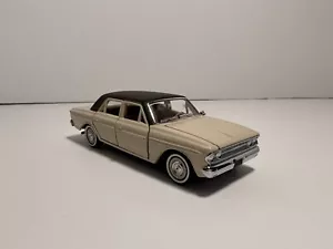 Franklin Mint 1:43 1963 Rambler Classic 660 beige con tetto nero come nuovo con custodia - Foto 1 di 10