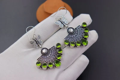 Pendientes mariposa peridoto vintage: latón plateado hecho a mano para mujer Foto 1 de 4