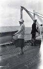 a19  Original Negative  1927 Hawaii Passenger ship Capt looking at lady 491a