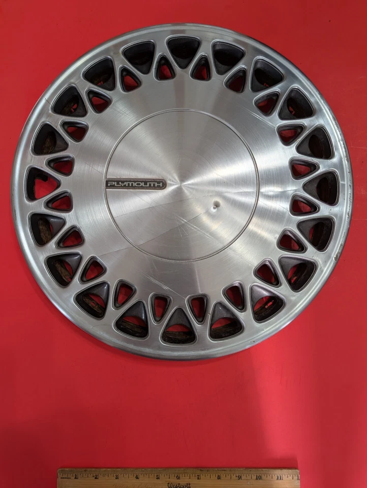 Cubierta de rueda de tapacubos de 15" Plymouth Grand Voyager 1991-1993 en bruto acero metal OEM Foto 1 de 4