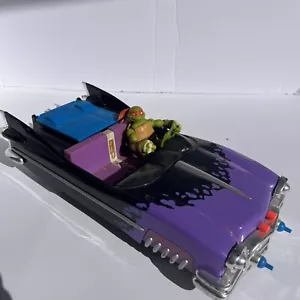 Coche crucero a pie de tortugas ninja mutantes adolescentes 1989 de colección con figura de Miguel Ángel - Imagen 1 de 11