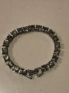 Bracciale tennis vintage bianco tono argento strass trasparenti firmato - Foto 1 di 7