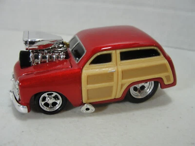 Muscle Machines 1950 Ford Woody Die Cast Car- 1:64 scale by Funline (2001) - Image 1 of 4