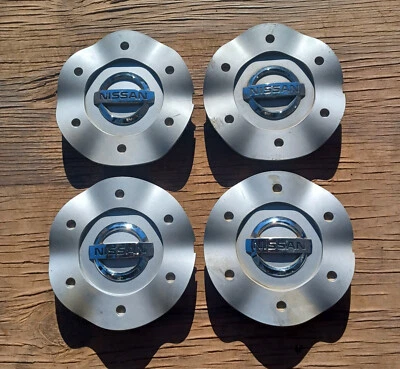 Комплект из 4 центральных колпаков Nissan Murano 2003-2005 p/n 40315 CA100 S2 - Изображение 1 из 3