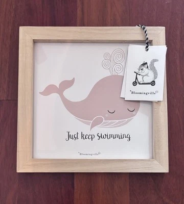 Impresión enmarcada de arte de pared Bloomingville Pink Whale Just Keep Swimming 8x8"" Foto 1 de 3
