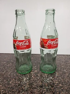Coca-Cola Classic Glass Bottles Christmas 1998 - Nice Condition - Empty - Qty 2 - Picture 1 of 6