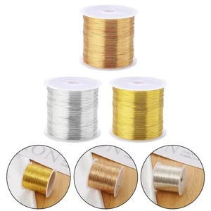 Create intricate designs with this 100m roll of gold and silver copper wire - Picture 1 of 5