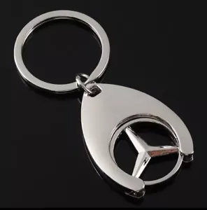 MERCEDES BENZ EINKAUFSTROLLEY CHIP STERN SILBER SCHLÜSSELANHÄNGER KEY CHAIN RING Münze - Bild 1 von 1