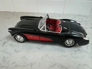 BURAGO 1957 CORVETTE ROADSTER BLACK/RED NIB 1/18 - Picture 1 of 4