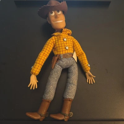 Toy Story Woody Talking Doll - Thinkway Toys Disney Pixar - Caja de voz electrónica Foto 1 de 4