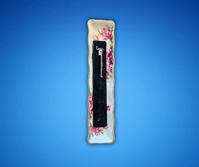 Bolígrafo Loree color plata en estuche original con bolígrafo rosa trey ceramina forrado en oro (#334) Foto 1 de 4