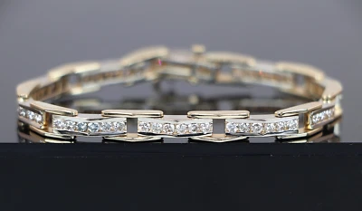 $8250 Brazalete de tenis redondo de diamantes de 7,25"" de oro blanco amarillo de 14 quilates con conjunto de canales de 3 quilates Foto 1 de 4