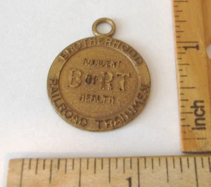B OF RT~BROTHERHOOD OF RAILROAD TRAINMEN~ACCIDENT HEALTH METAL TAG~39136 - Picture 1 of 2