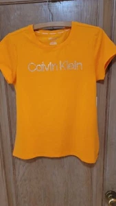 Calvin Klein Women's Breeze Clasic Short Sleeve T-Shirt Orange/Tumeric K2XHH824 - Picture 1 of 8