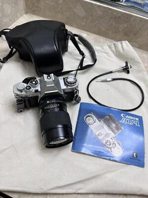 Cámara fotográfica Canon AV-1 35mm SLR con lente, cubierta de cámara de cuero, hecha en Japón Foto 1 de 4