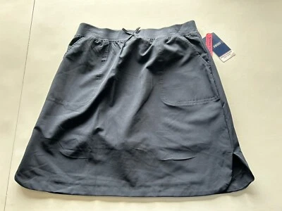 Falda corta uniforme IZOD para niña talla 16 azul marino falda elástica con accesorio corto. Foto 1 de 4