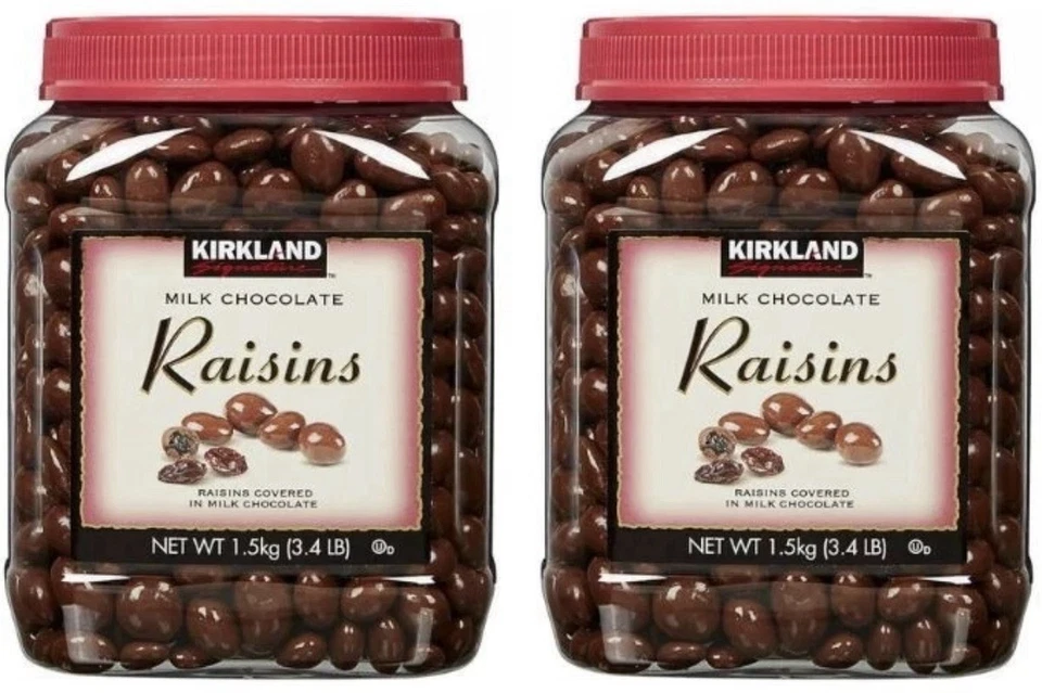 2 paquetes de pasas cubiertas de chocolate con leche Kirkland Signature de 3,4 libras cada paquete Foto 1 de 1